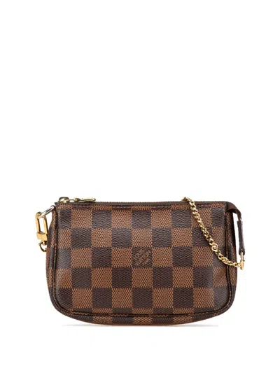 Pre-owned Louis Vuitton 2015 Damier Ebene Mini Pochette Accessoires Handbag In Brown
