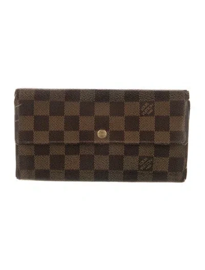 Pre-owned Louis Vuitton 2015 Damier Ebene Pattern International Wallet In Brown