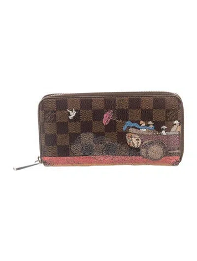 Pre-owned Louis Vuitton 2015 Damier Ebene Pattern Zippy Wallet In Brown