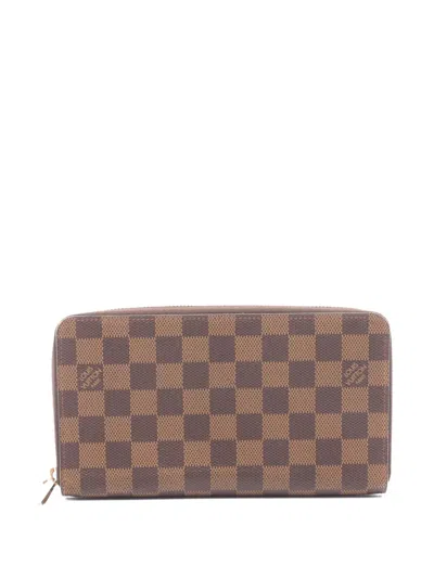 Pre-owned Louis Vuitton 2015 Damier Ebène Wallet In Brown