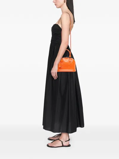 Pre-owned Louis Vuitton 2015 Monogram Vernis Alma Bb Satchel In Orange