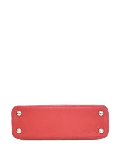 Pre-owned Louis Vuitton 2015 Taurillon Capucines Bb Satchel In Red