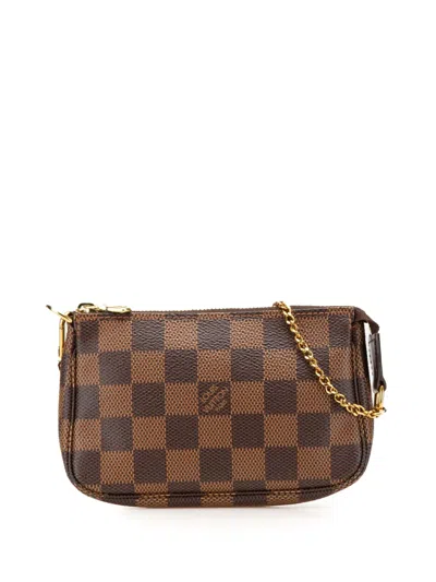 Pre-owned Louis Vuitton 2016 Damier Ebene Mini Pochette Accessoires Handbag In Brown