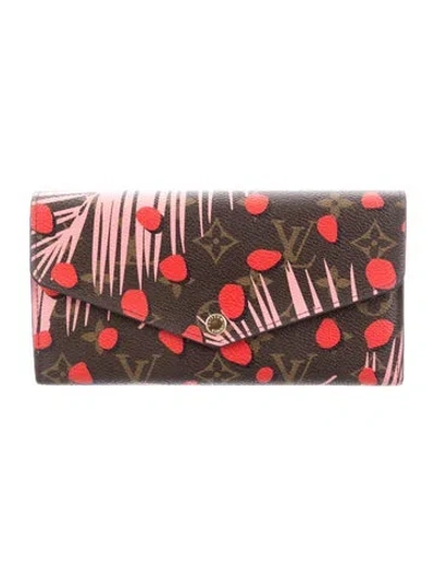 Pre-owned Louis Vuitton 2016 Lv Monogram Sarah Wallet In Brown