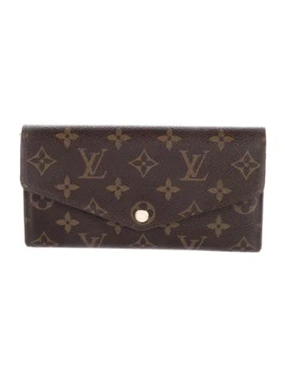 Pre-owned Louis Vuitton 2016 Lv Monogram Sarah Wallet In Brown