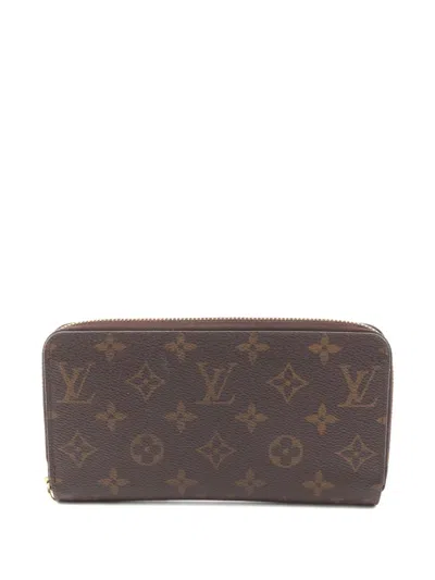 Pre-owned Louis Vuitton 2016 Monogram Round Zipper Wallet In Brown
