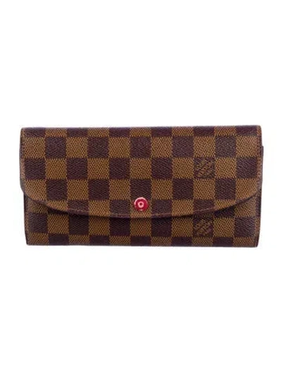 Pre-owned Louis Vuitton 2017 Damier Ebene Pattern Emilie Wallet In Brown