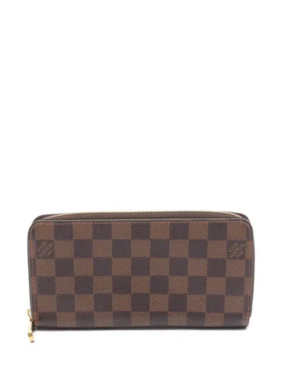 Pre-owned Louis Vuitton 2017 Damier Ebene Zippy Wallet In Brown