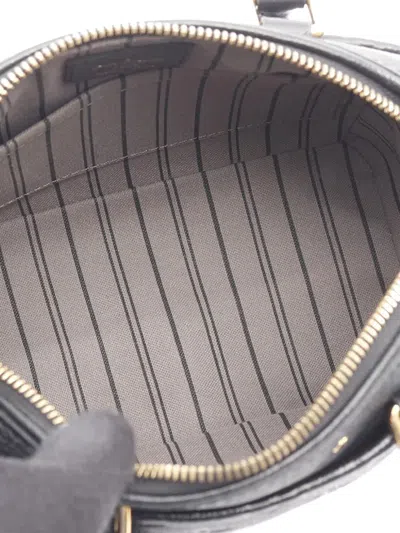 Pre-owned Louis Vuitton 2017 Monogram Empreinte Speedy Bandouliere 20 Satchel In Black