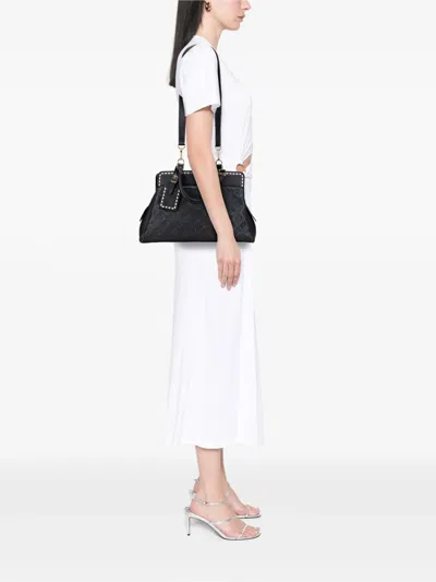Pre-owned Louis Vuitton 2017 Monogram Empreinte Vosges Mm Satchel In Black
