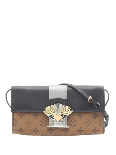 Pre-owned Louis Vuitton 2017 Monogram Reverse Column Clutch Bag In Brown
