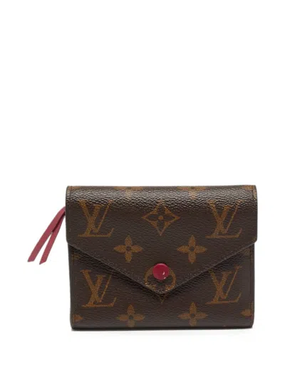 Pre-owned Louis Vuitton 2017 Victorine Monogram Wallet In Brown