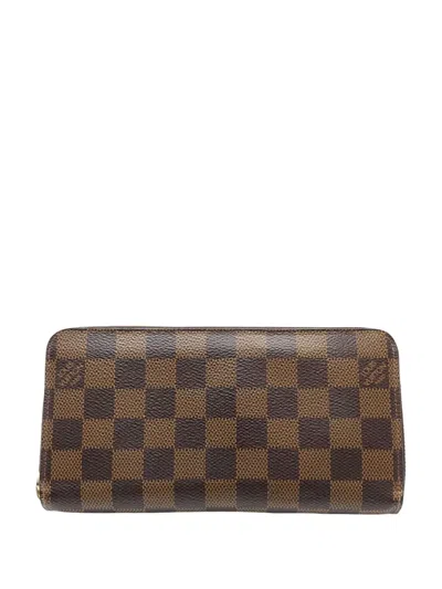 Pre-owned Louis Vuitton 2018 Damier Ebene Zippy Wallet Long Wallets In Brown