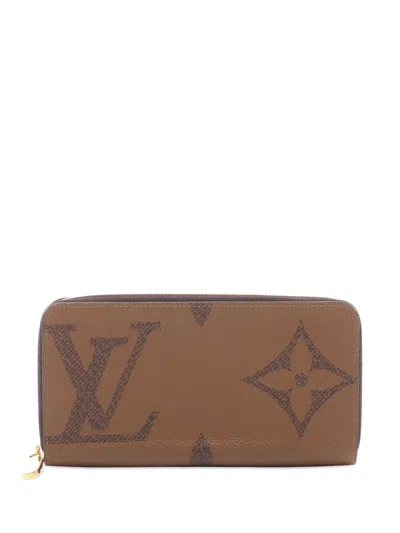 Pre-owned Louis Vuitton 2019-2025 Monogram Giant Reverse Zippy Wallet Long Wallets In Brown