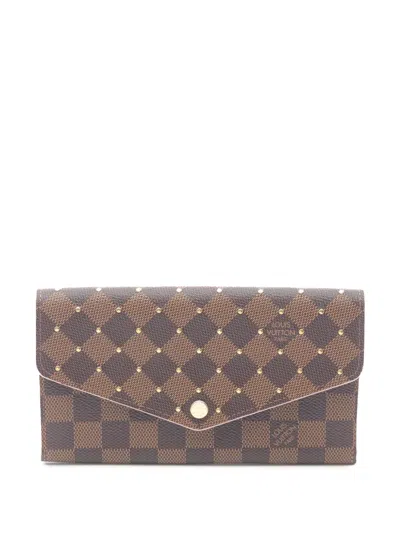 Pre-owned Louis Vuitton 2019 Damier Ebene Studded Sarah Wallet Long Wallets In Brown
