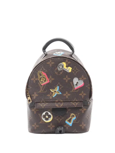 Pre-owned Louis Vuitton 2019 Monogram Love Lock Mini Palm Springs Backpack In Brown