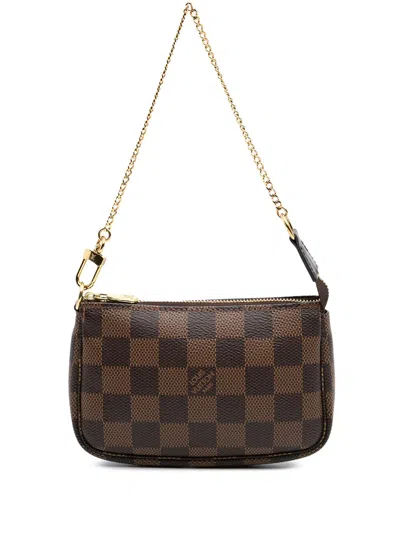 Pre-owned Louis Vuitton 2020 Damier Ebene Mini Pochette Accessoires Handbag In Brown