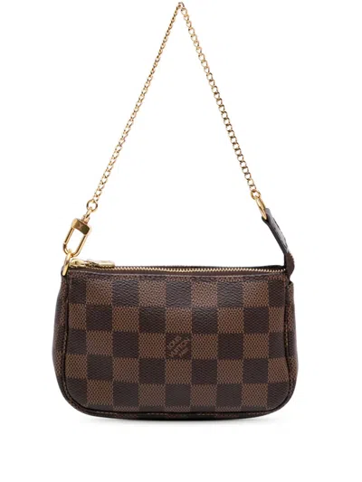 Pre-owned Louis Vuitton 2020 Damier Ebene Mini Pochette Accessoires Handbag In Brown