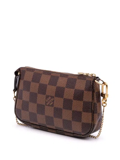 Pre-owned Louis Vuitton 2020 Damier Ebene Mini Pochette Accessoires Handbag In Brown