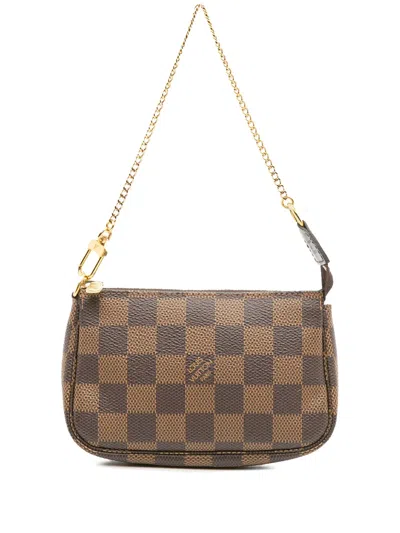 Pre-owned Louis Vuitton 2020 Damier Ebene Mini Pochette Accessoires Handbag In Brown