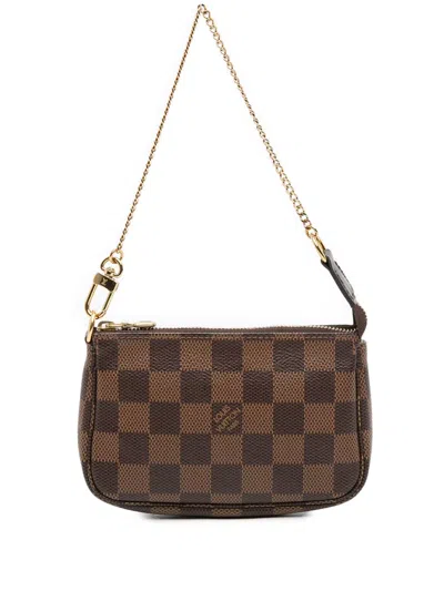 Pre-owned Louis Vuitton 2020 Damier Ebene Mini Pochette Accessoires Handbag In Brown