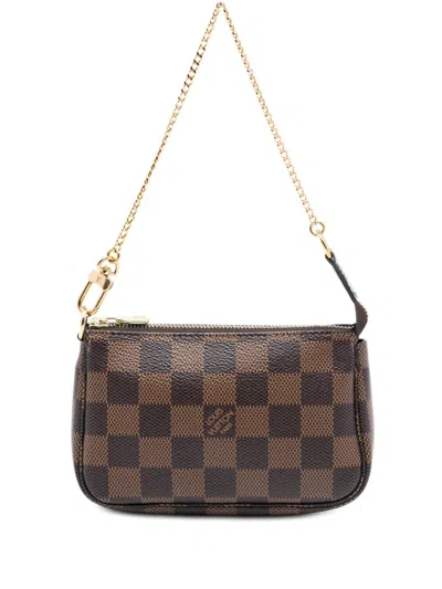 Pre-owned Louis Vuitton 2020 Damier Ebene Mini Pochette Accessoires Handbag In Brown