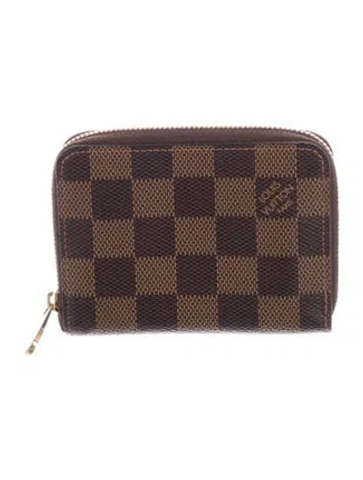 Pre-owned Louis Vuitton 2020 Damier Ebene Pattern Zippy Coin Purse In Brown