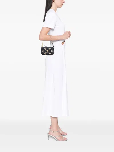 Pre-owned Louis Vuitton 2021-2025 Bicolor Monogram Empreinte Mini Pochette Accessoires Handbag In Black