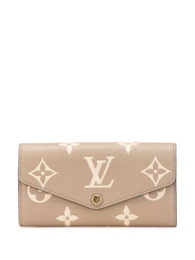 Pre-owned Louis Vuitton 2021-2025 Bicolor Monogram Empreinte Sarah Wallet Long Wallets In Brown