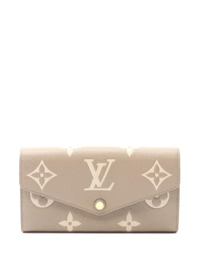 Pre-owned Louis Vuitton 2021-2025 Bicolor Monogram Empreinte Sarah Wallet Long Wallets In Brown