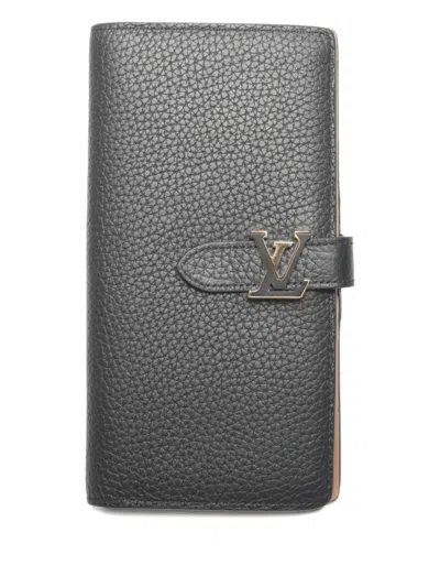 Pre-owned Louis Vuitton 2021-2025 Capucines Buckle Wallet In Black