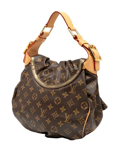 Pre-owned Louis Vuitton 2021-2025 Limited Edition Monogram Epices Kalahari Pm Hobo Bag In Brown