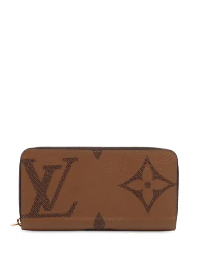Pre-owned Louis Vuitton 2021-2025 Monogram Giant Reverse Zippy Wallet Long Wallets In Brown