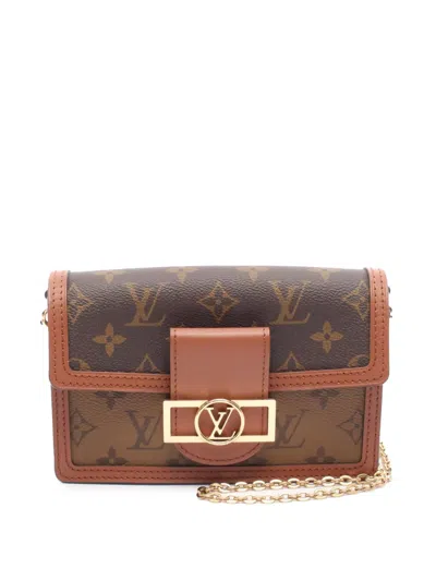 Pre-owned Louis Vuitton 2021-2025 Monogram Reverse Dauphine Wallet On Chain Crossbody Bag In Brown