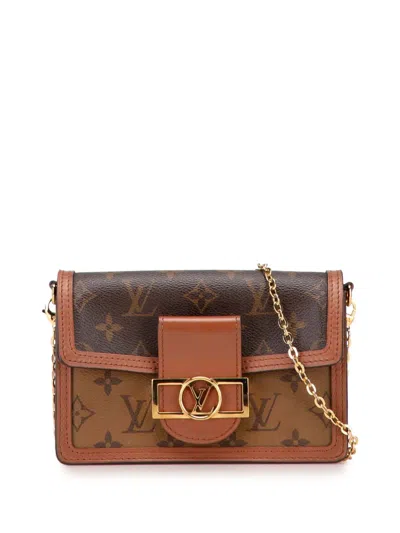 Pre-owned Louis Vuitton 2021-2025 Monogram Reverse Dauphine Wallet On Chain Crossbody Bag In Brown