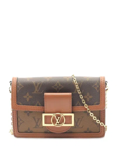 Pre-owned Louis Vuitton 2021-2025 Monogram Reverse Dauphine Wallet On Chain Crossbody Bag In Brown