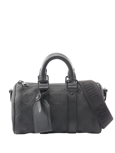 Pre-owned Louis Vuitton 2021-2025 Monogram Taurillon Keepall Bandouliere 25 Satchel In Black