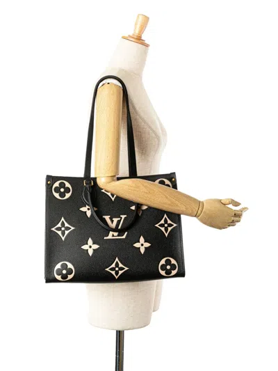 Pre-owned Louis Vuitton 2021 Bicolor Monogram Empreinte Giant Onthego Mm Satchel