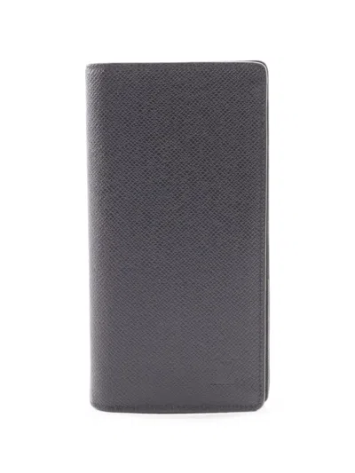 Pre-owned Louis Vuitton 2021 Brazza Taiga-leather Long Wallet In Black