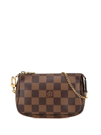 Pre-owned Louis Vuitton 2021 Damier Ebene Mini Pochette Accessoires Handbag In Brown