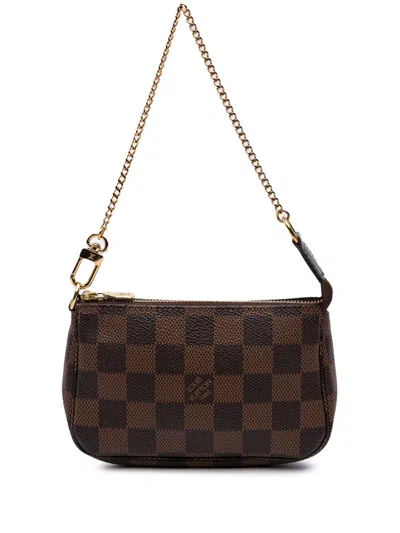 Pre-owned Louis Vuitton 2021 Damier Ebene Mini Pochette Accessoires Handbag In Brown