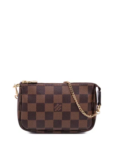 Pre-owned Louis Vuitton 2021 Damier Ebene Mini Pochette Accessoires Handbag In Brown