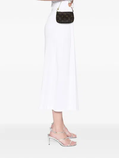 Pre-owned Louis Vuitton 2021 Monogram Mini Pochette Accessoires Handbag In Brown