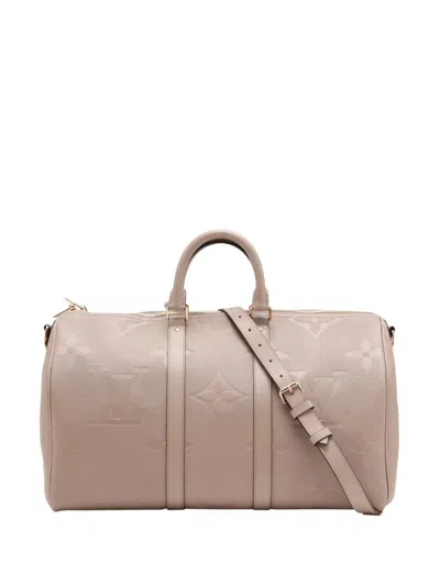 Pre-owned Louis Vuitton 2021-2026 Monogram Empreinte Giant Keepall Bandouliere 45 Travel Bag In Neutrals