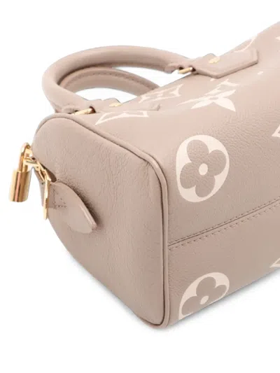 Pre-owned Louis Vuitton 2021-2026 Monogram Empreinte Speedy Bandouliere 20 Satchel In Neutrals