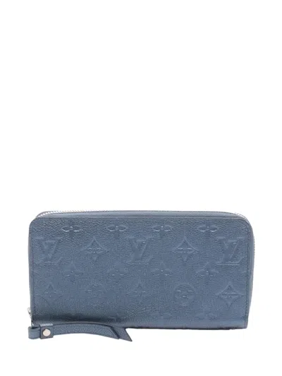 Pre-owned Louis Vuitton 2021-2026 Monogram Empreinte Zippy Wallet Long Wallets In Blue