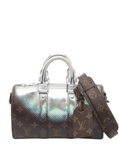 Pre-owned Louis Vuitton 2021-2026 Monogram Metallic Nebula Keepall Bandouliere 25 Satchel In Brown