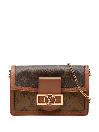 Pre-owned Louis Vuitton 2021-2026 Monogram Reverse Dauphine Wallet On Chain Crossbody Bag In Brown