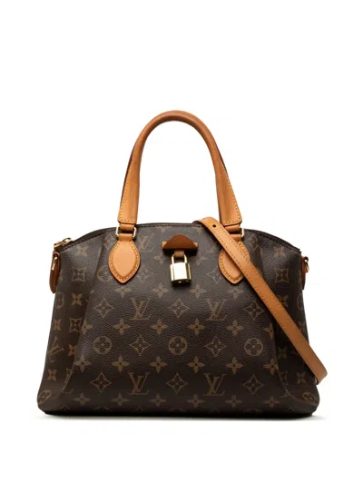 Pre-owned Louis Vuitton 2021-2026 Monogram Rivoli Pm Satchel In Brown