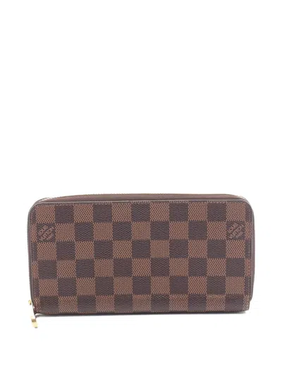 Pre-owned Louis Vuitton 2021s Damier Ebene Zippy Wallet In Brown